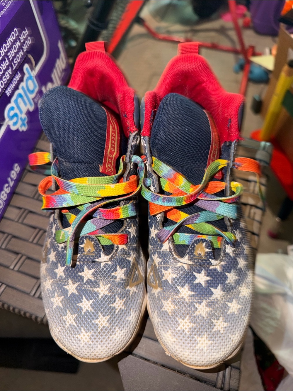 Under Armour Kids Navy Star football cleats with Red Lining & Rainbow Laces